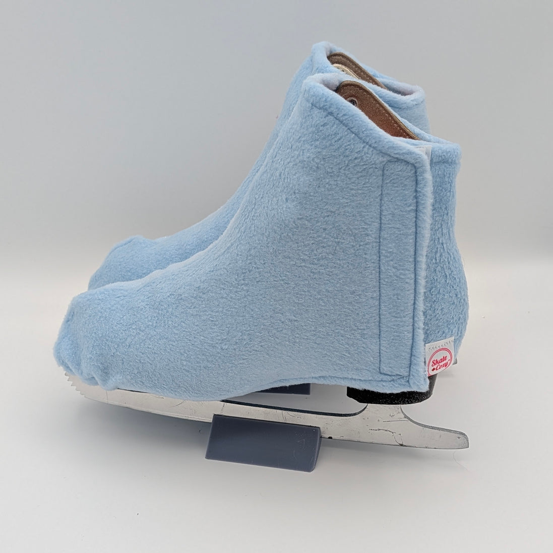Perwinkle Sparkle figure skate boot cover. Light blue fleece with a touch of sparkle on top