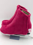 Deep pink figure skate boot covers on a white background